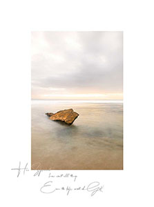 Single rock in foreground of seashore with fading white horizon. Button for Deep Gallery.